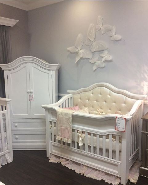 white upholstered crib