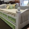 Country hill round top spindle bed with drawers and trundle